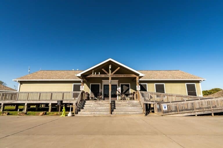 Resort office and clubhouse exterior with covered entrance